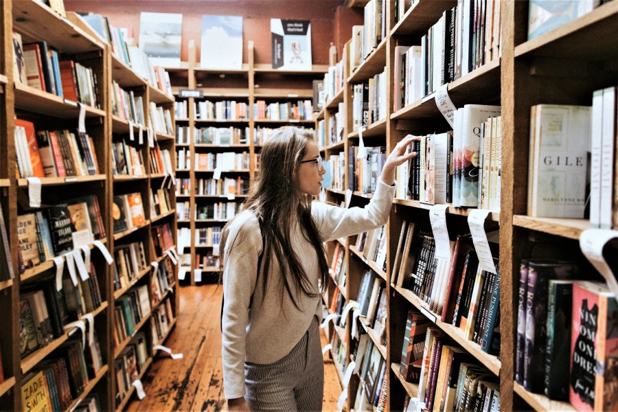 Image of Young woman in library