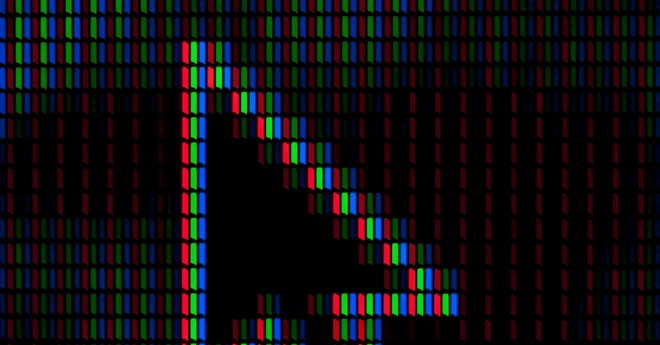 Image of a pixelated close-up of a computer screen shows a large black cursor arrow among red, green, and blue subpixels.