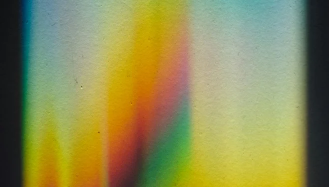 Rainbow light on black background