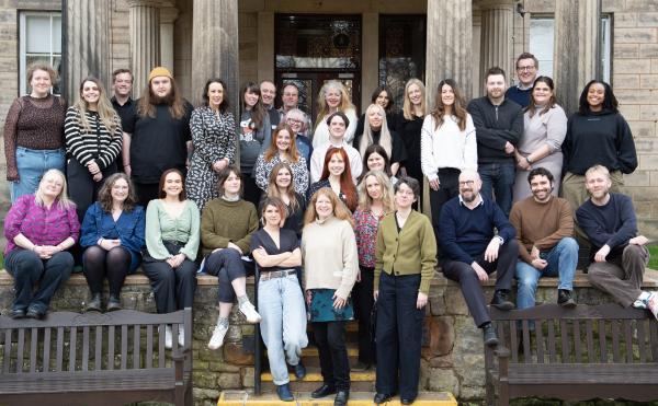 Image of members of staff of The Audience Agency posing for a team photos