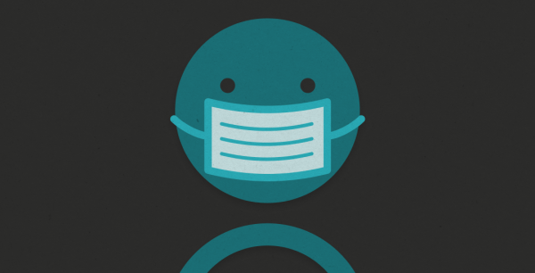 Image of a smiley face wearing a light blue mask against a dark background.