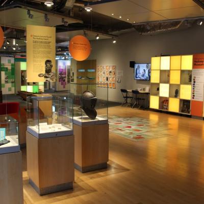 An interior of a museum with bright displays