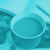 A cup of tea, a biscuit and a notebook