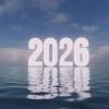 The numbers 2026 on a blue sky backdrop, reflected in blue water